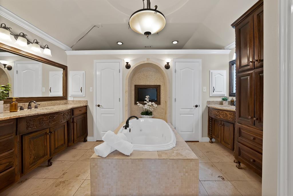 1110 McCampbell Road Mansfield, TX 76063 - Photo 4 of 39 a spacious bathroom with a sink double vanity and a mirror