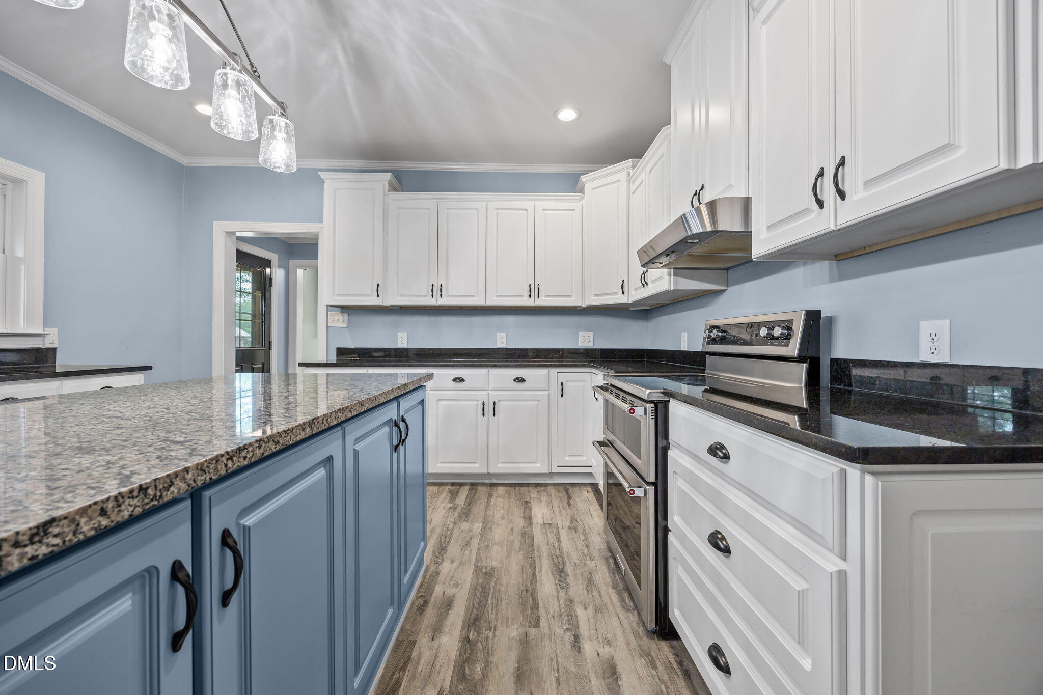 3611 Chewning Road Oxford, NC 27565 - Photo 32 of 45 a kitchen with granite countertop white cabinets and white appliances