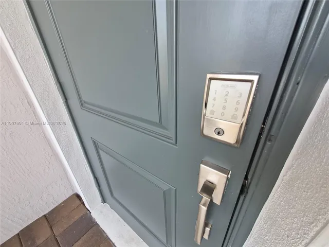 a kitchen with a stove and a microwave