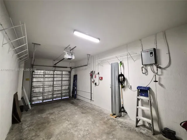 a view of empty room with fan