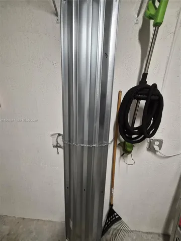 a bathroom with a double vanity sink toilet and shower