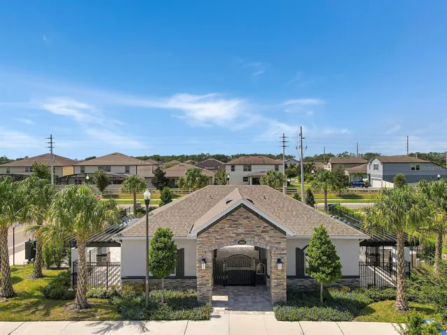 an aerial view of a house with a garden