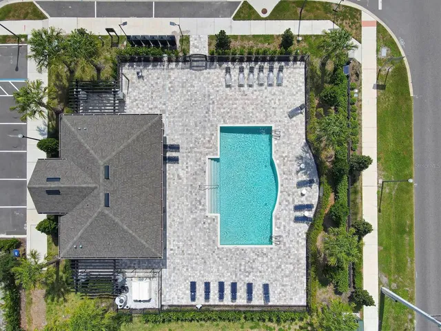 an aerial view of a house with a garden