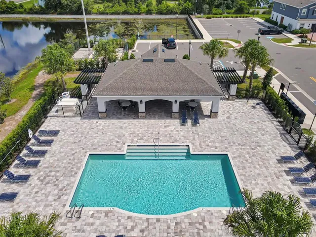 an aerial view of a house with a garden