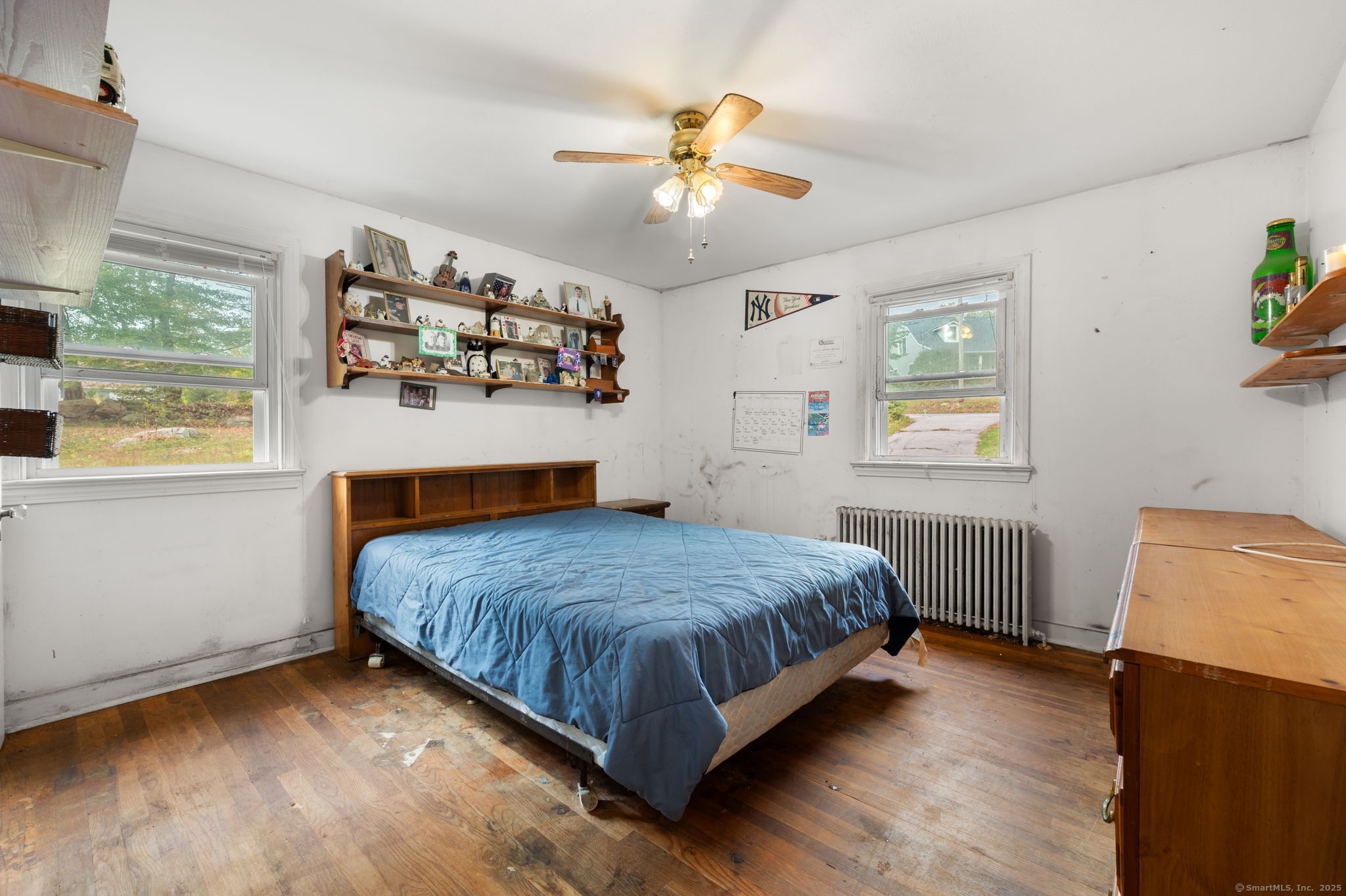 210 Butlertown Road Waterford, CT 06385 - Photo 12 of 25 a bedroom with a bed and window