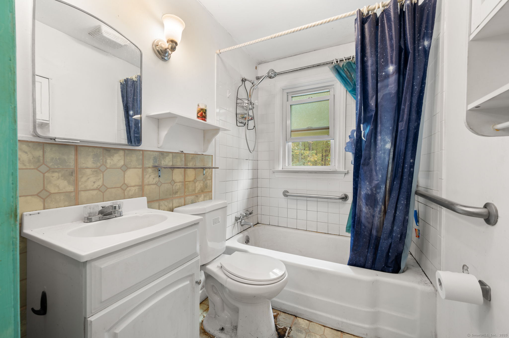 210 Butlertown Road Waterford, CT 06385 - Photo 15 of 25 a bathroom with a sink a toilet and shower