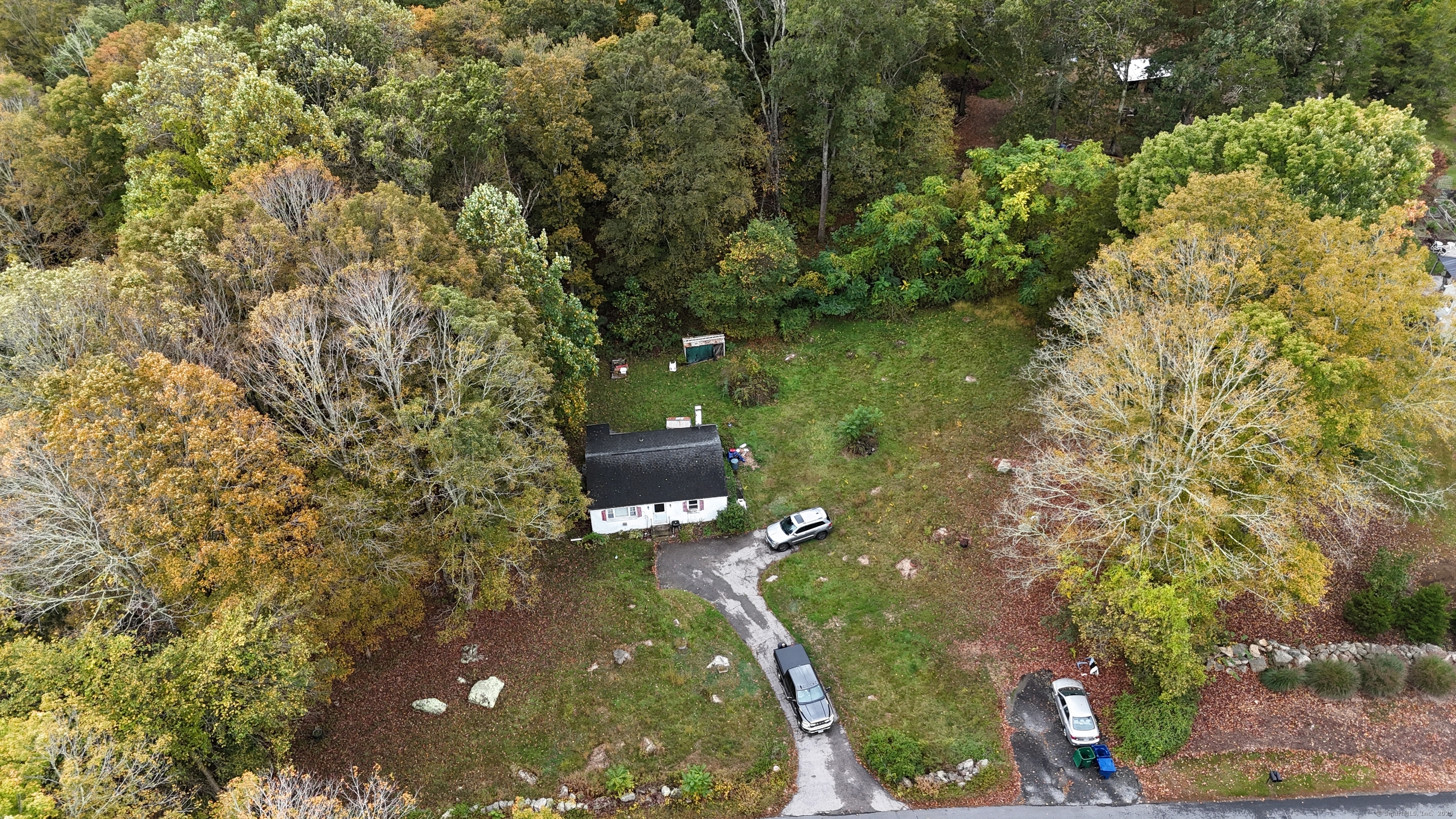 210 Butlertown Road Waterford, CT 06385 - Photo 23 of 25 a backyard of a house with lots of green space
