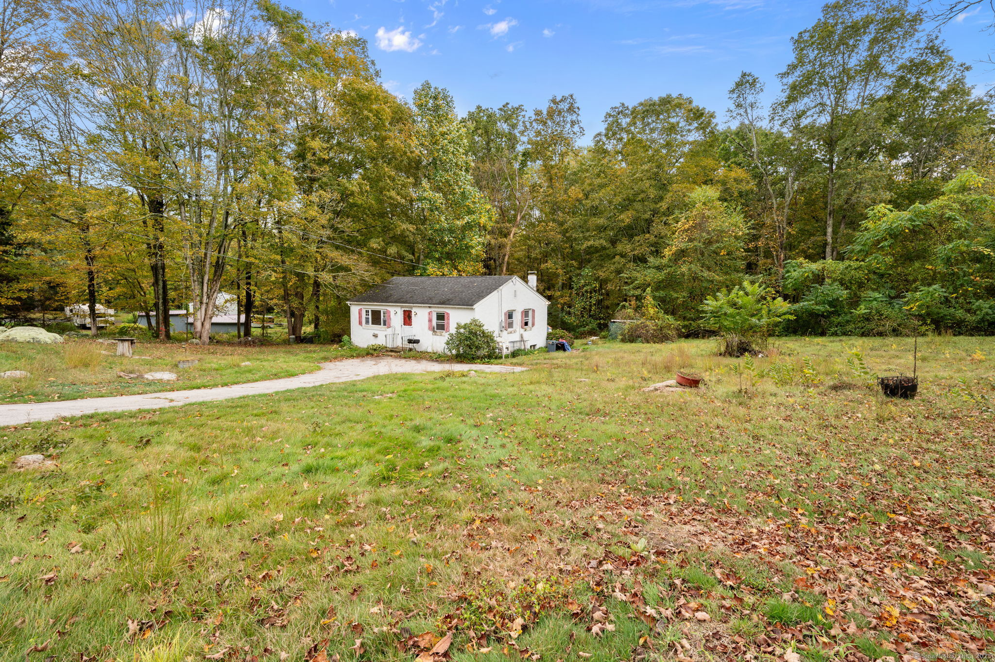 210 Butlertown Road Waterford, CT 06385 - Photo 3 of 25 a view of a big yard with large trees