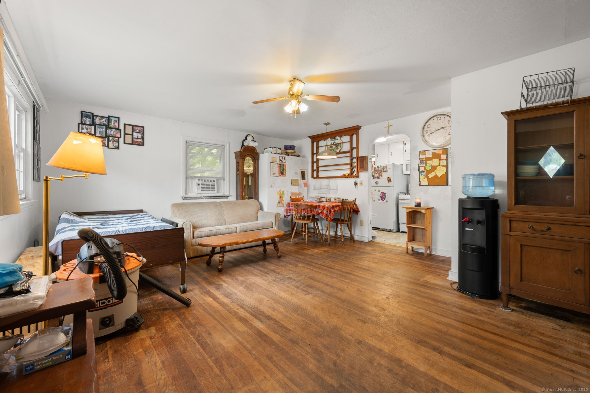 210 Butlertown Road Waterford, CT 06385 - Photo 7 of 25 a living room with furniture and wooden floor