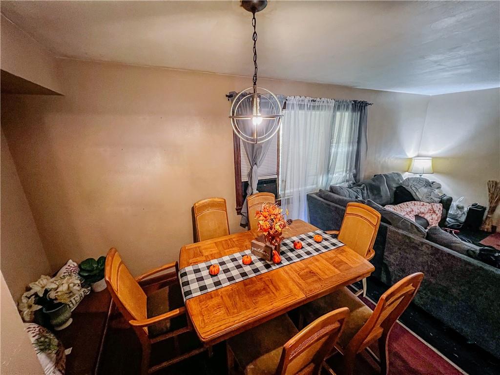 1638 Shady Drive Farrell, PA 16121 - Photo 6 of 21 a dining room with furniture and wooden floor