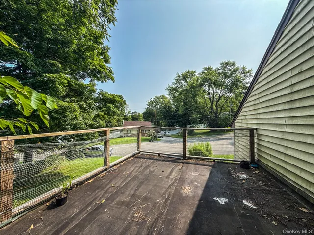 a workspace with furniture and a window