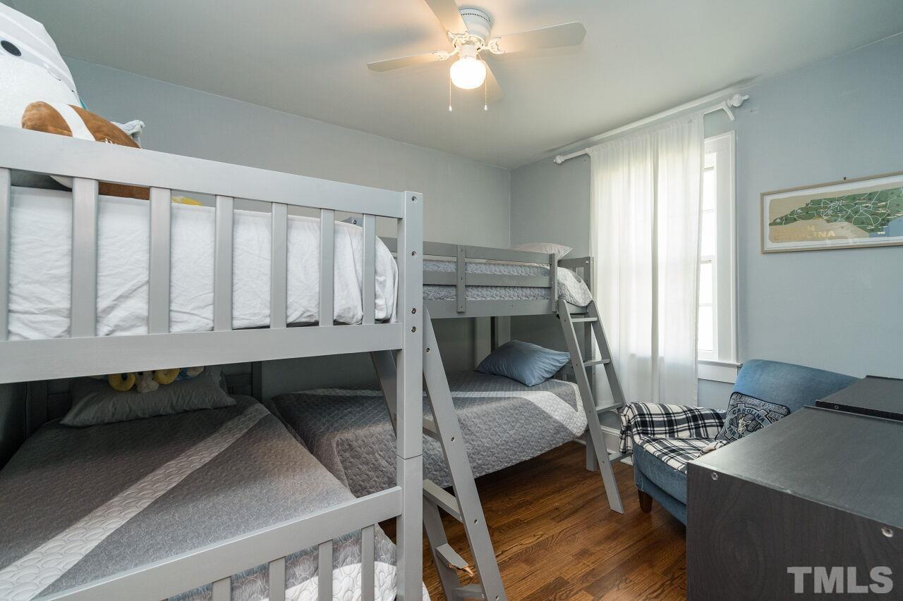 1621 Lorraine Road Raleigh, NC 27607 - Photo 23 of 28 a bedroom with a bed and a window