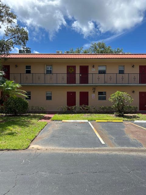 1955 Southwest Palm City Road, Unit H Stuart, FL 34994 - Photo 1 of 22 a view of city with tall buildings