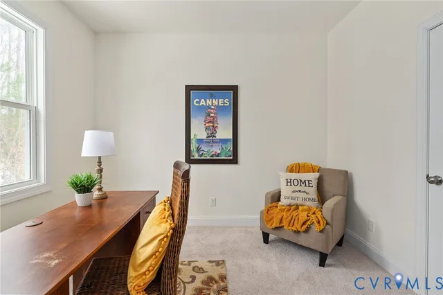 a room with furniture and a window