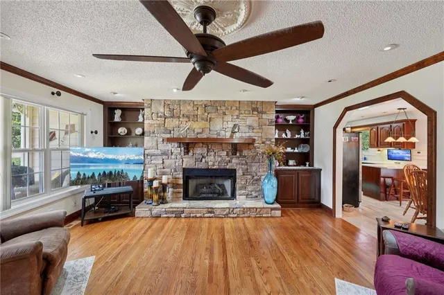 a kitchen with stainless steel appliances granite countertop a stove and a refrigerator