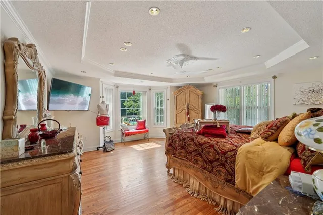 a living room with lots of furniture and gym equipment