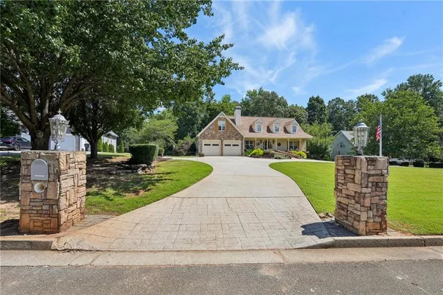 a view of a park with large trees