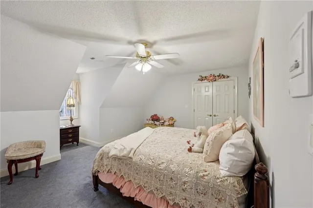 a view of a swimming pool with a lounge chair