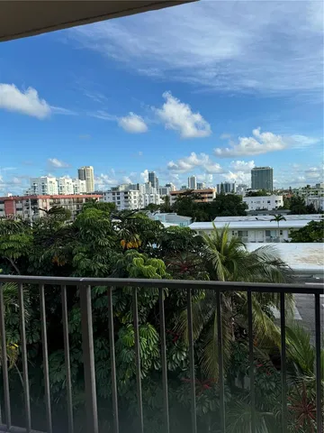 a view of a balcony with an outdoor space