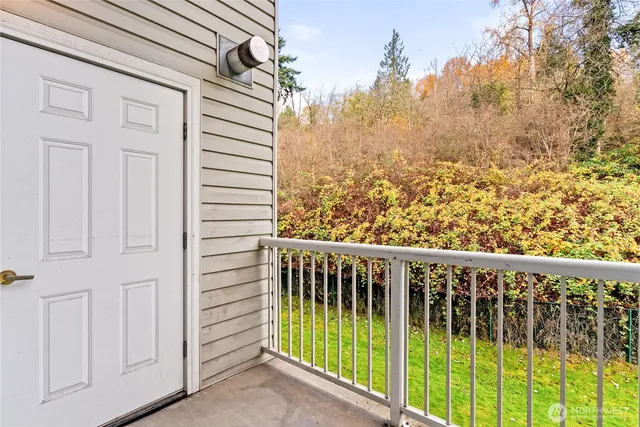 a view of a balcony with an outdoor space