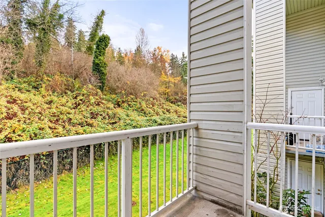a view of a balcony with an outdoor space
