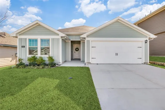 a view of a house with garden