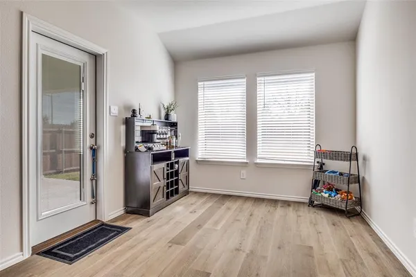 a room with furniture and a window