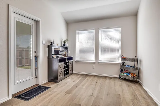 a room with furniture and a window