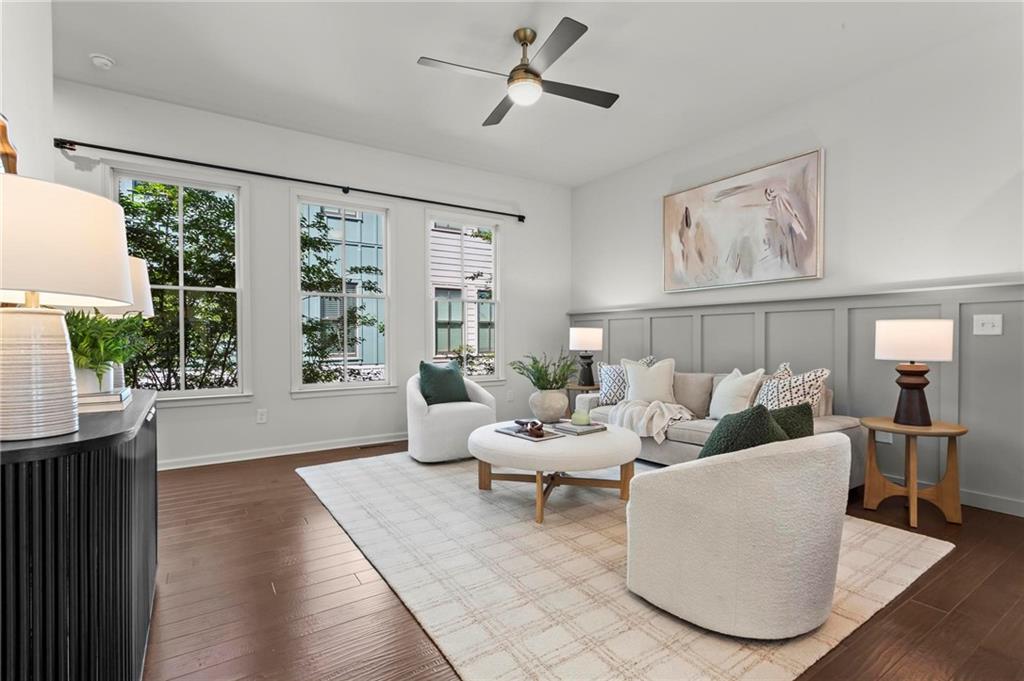 718 Needletail Way Atlanta, GA 30312 - Photo 13 of 44 a living room with furniture and a large window