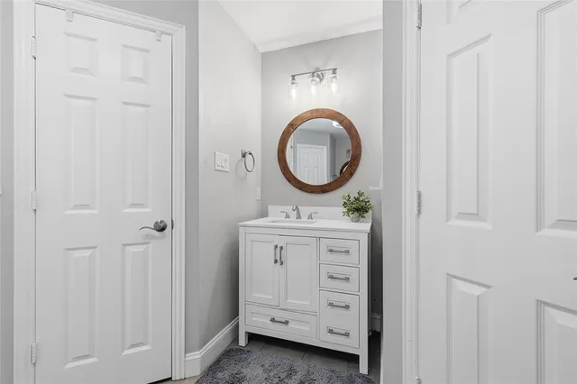 a bathroom with a bathtub and a sink