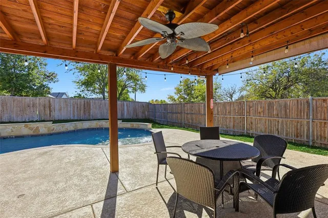 a bathroom with a toilet a sink and a mirror