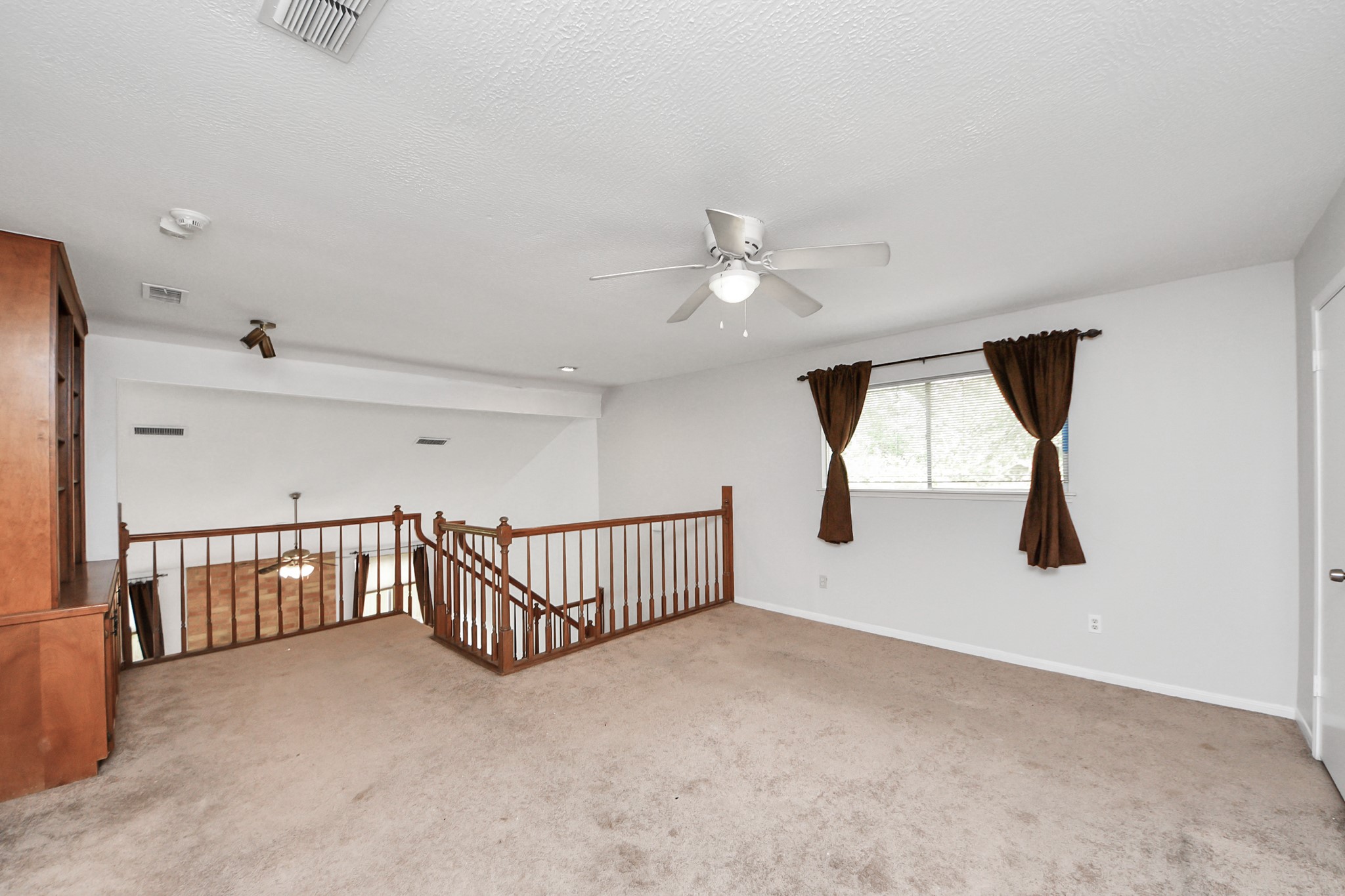6706 Trebeck Lane Spring, TX 77379 - Photo 31 of 46 an empty room with windows