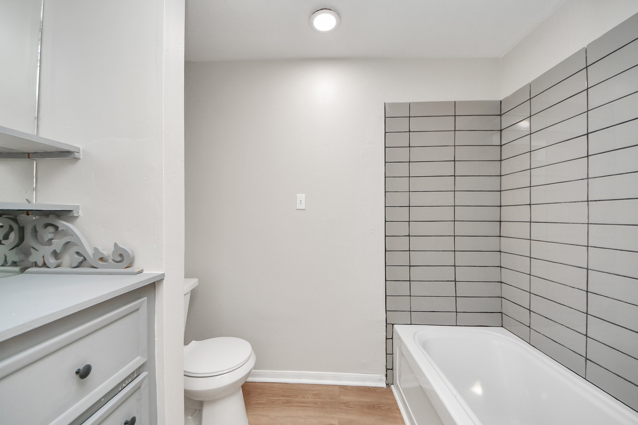 6706 Trebeck Lane Spring, TX 77379 - Photo 34 of 46 a bathroom with a sink a toilet and shower