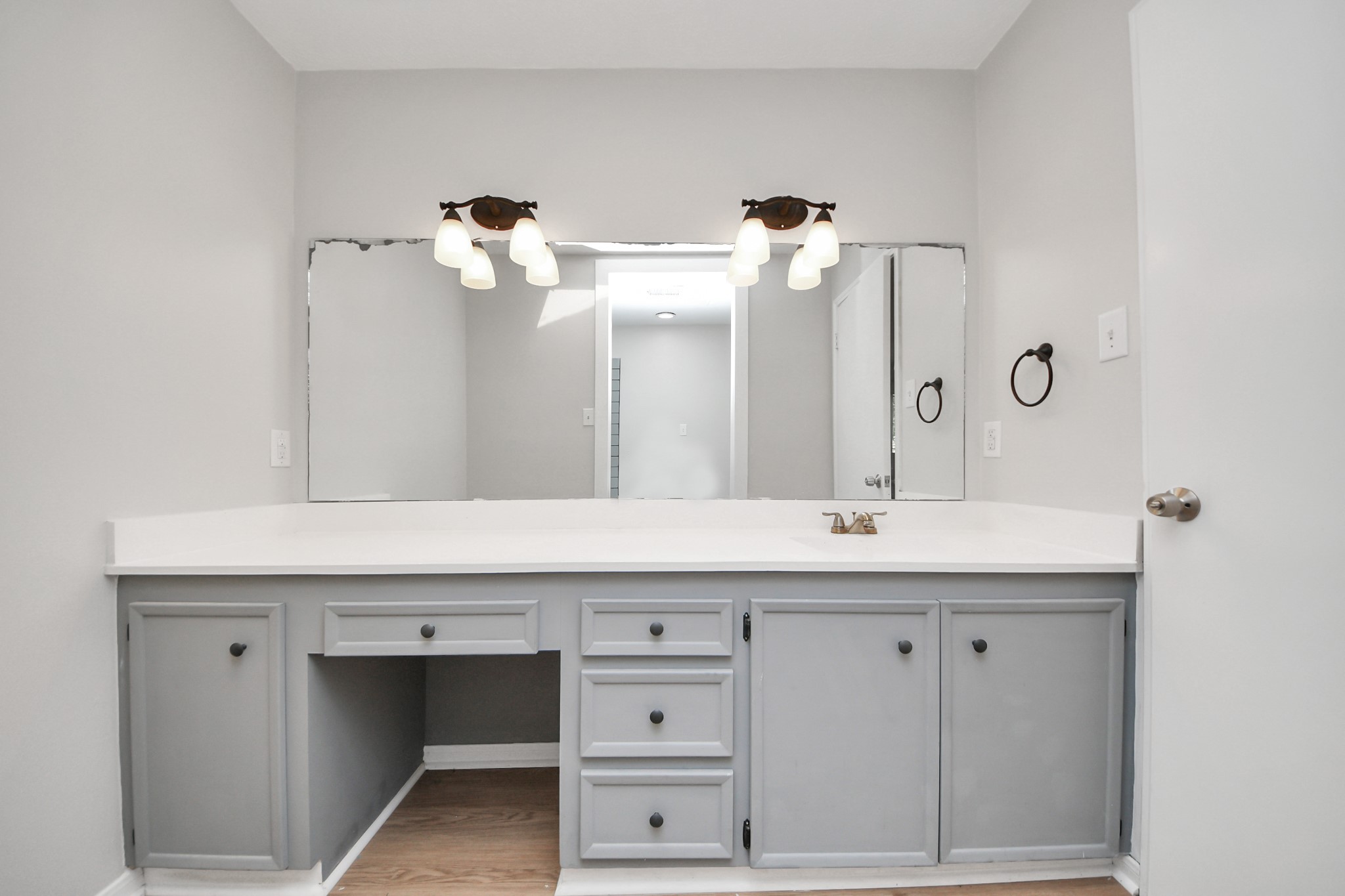 6706 Trebeck Lane Spring, TX 77379 - Photo 35 of 46 a bathroom with a double vanity sink and a mirror