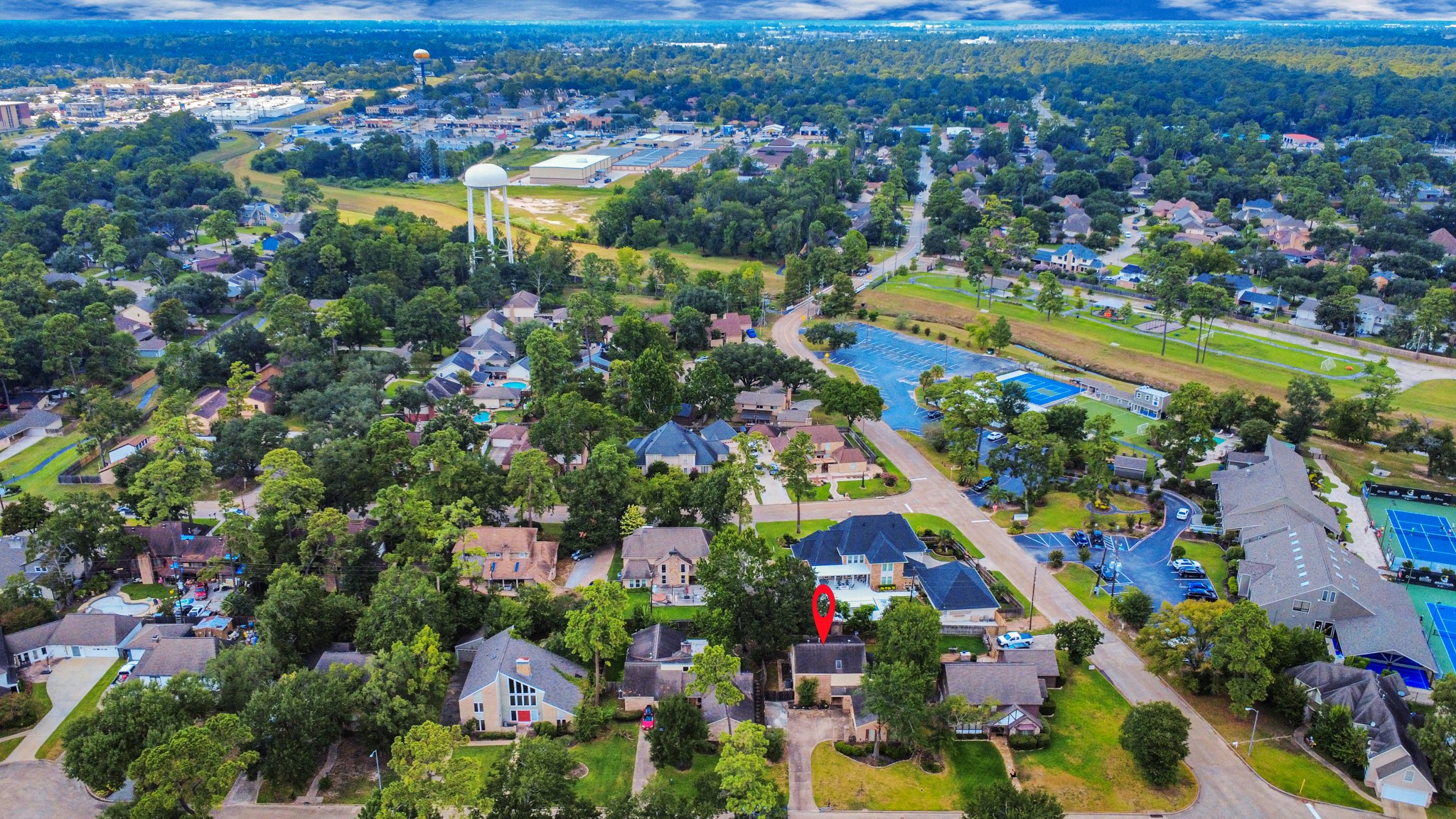 6706 Trebeck Lane Spring, TX 77379 - Photo 44 of 46 an aerial view of residential houses with outdoor space and trees