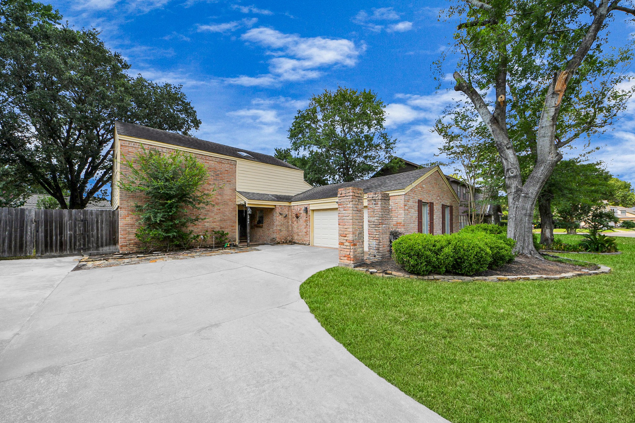 6706 Trebeck Lane Spring, TX 77379 - Photo 5 of 46 a front view of a house with a yard and garage