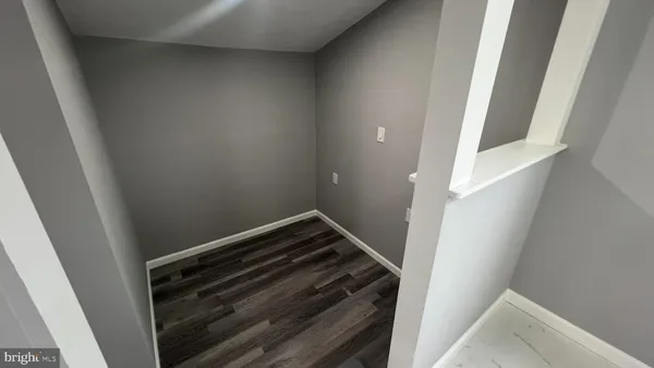 a view of cabinets and window