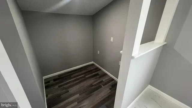 a view of cabinets and window