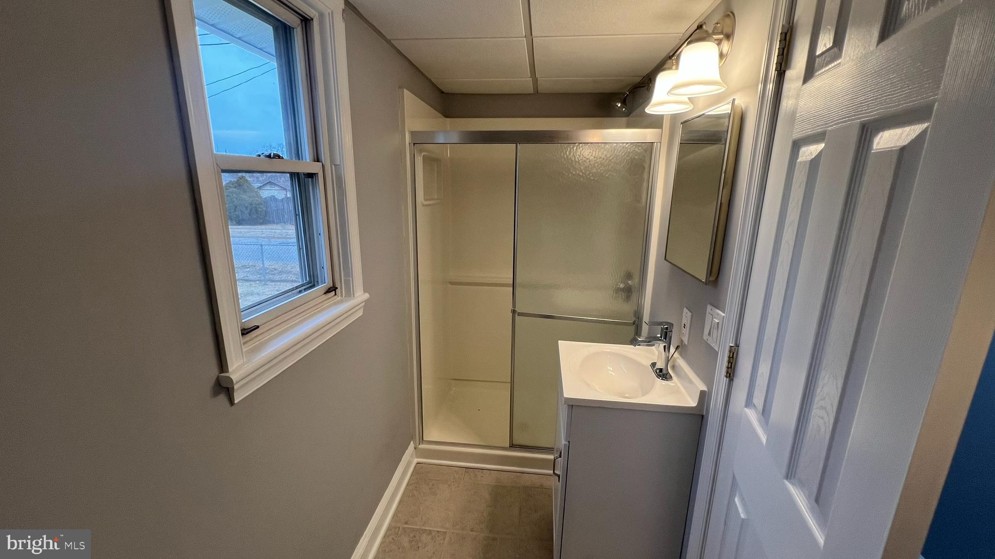434 East Maple Avenue Lindenwold, NJ 08021 - Photo 20 of 36 a bathroom with a shower and a sink