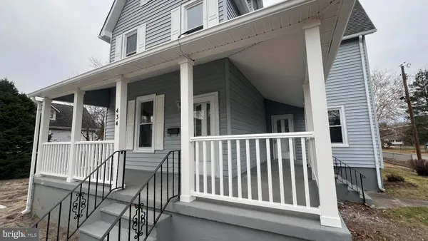 a view of a house with a porch