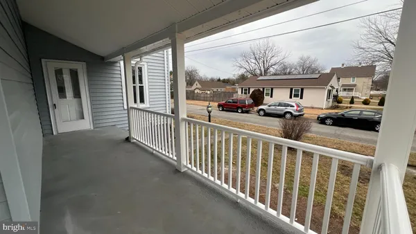 a view of a street from a balcony
