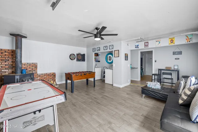 a view of a dining room with furniture and a livingroom
