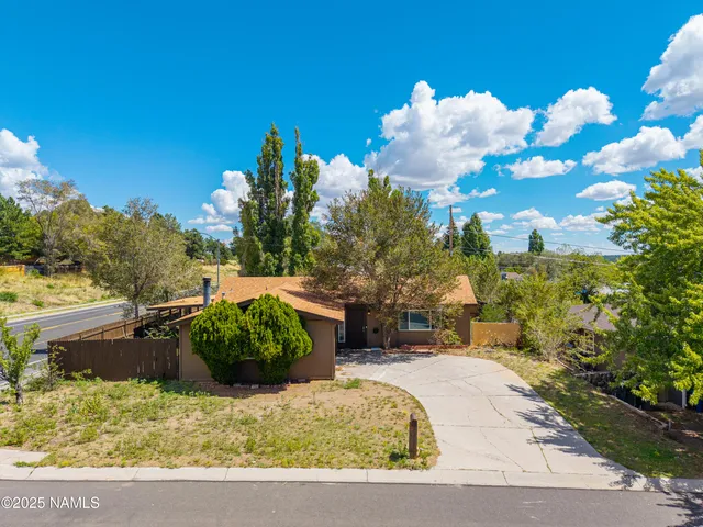 a vase of flowers sitting on a table