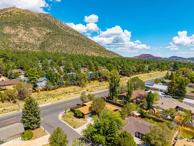 a view of swimming pool from a balcony