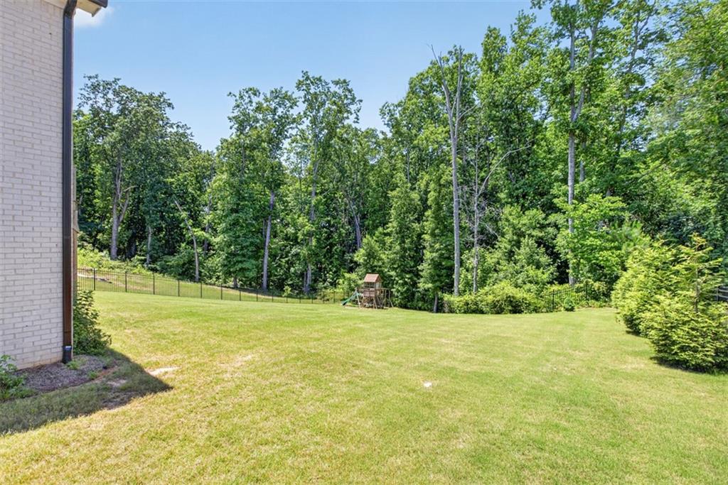 3528 North Bogan Road Buford, GA 30519 - Photo 79 of 79 a view of a yard with an outdoor space