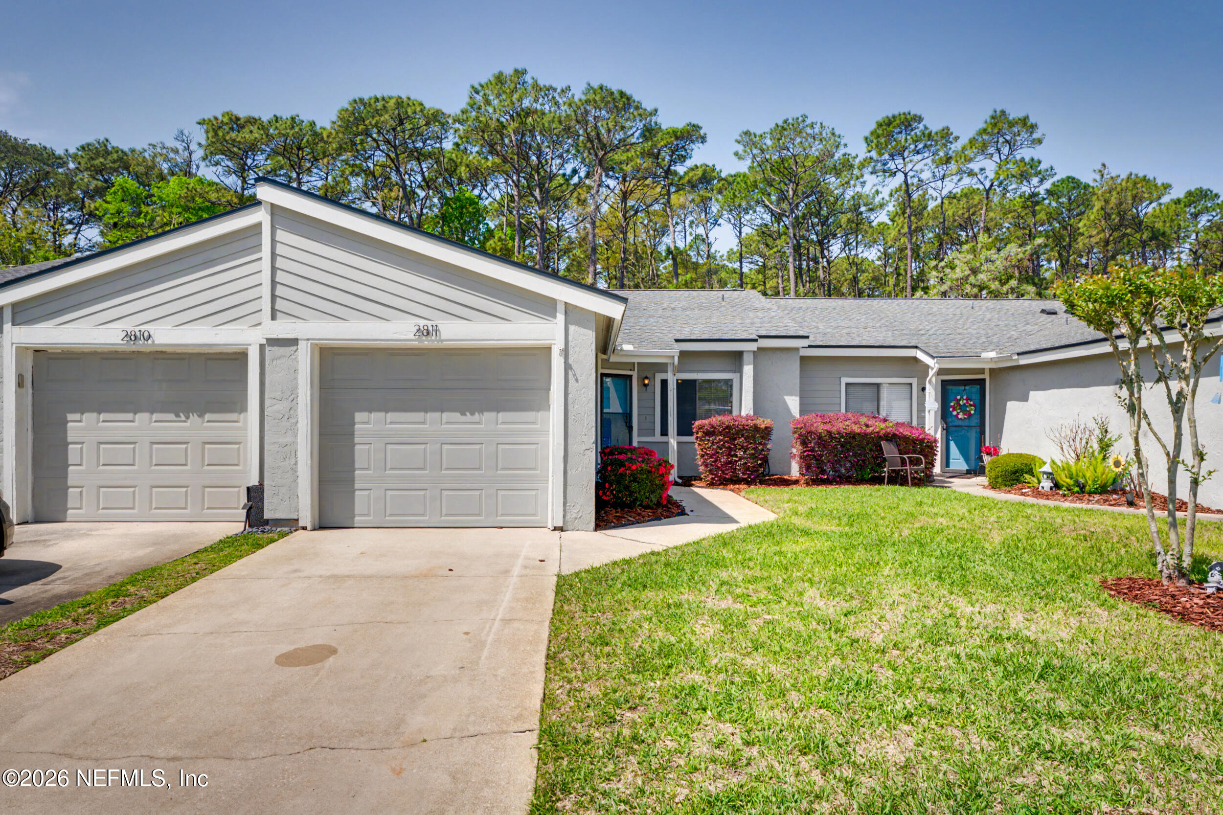 2811 Sea Hawk Drive Ponte Vedra Beach, FL 32082 - Photo 1 of 24 a front view of a house with garden