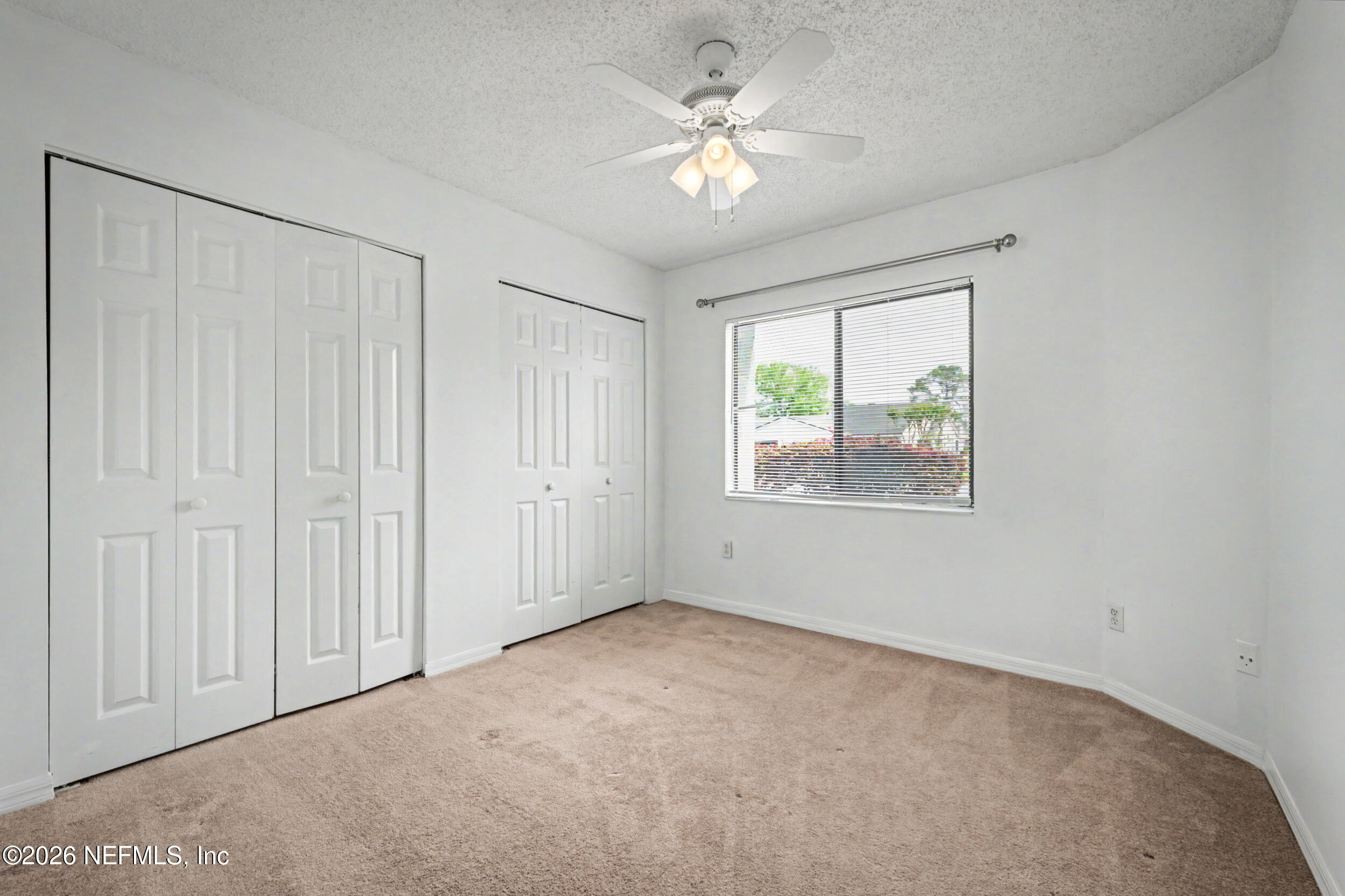 2811 Sea Hawk Drive Ponte Vedra Beach, FL 32082 - Photo 12 of 24 an empty room with windows and fan