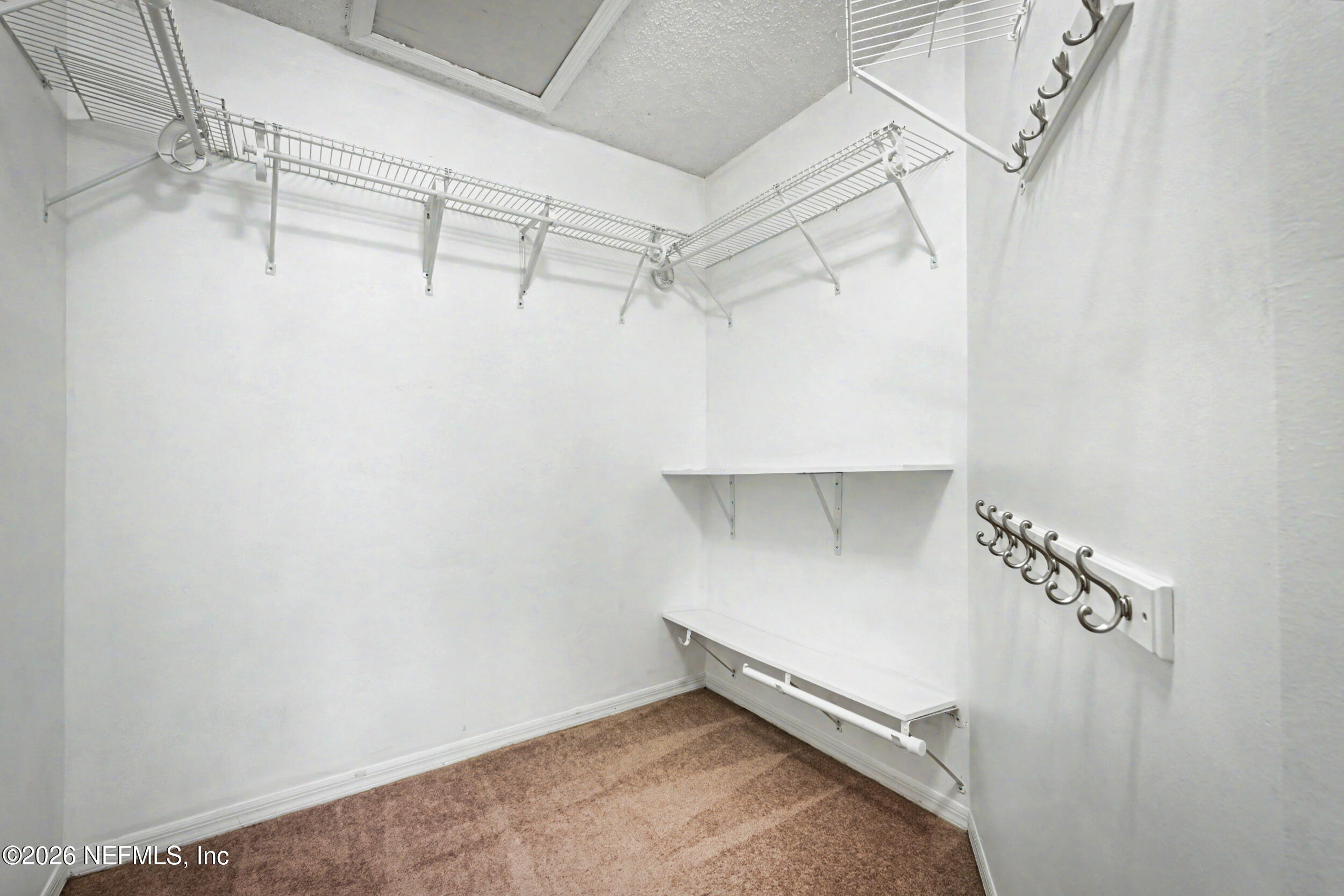 2811 Sea Hawk Drive Ponte Vedra Beach, FL 32082 - Photo 17 of 24 a view of a room with racks on the wall