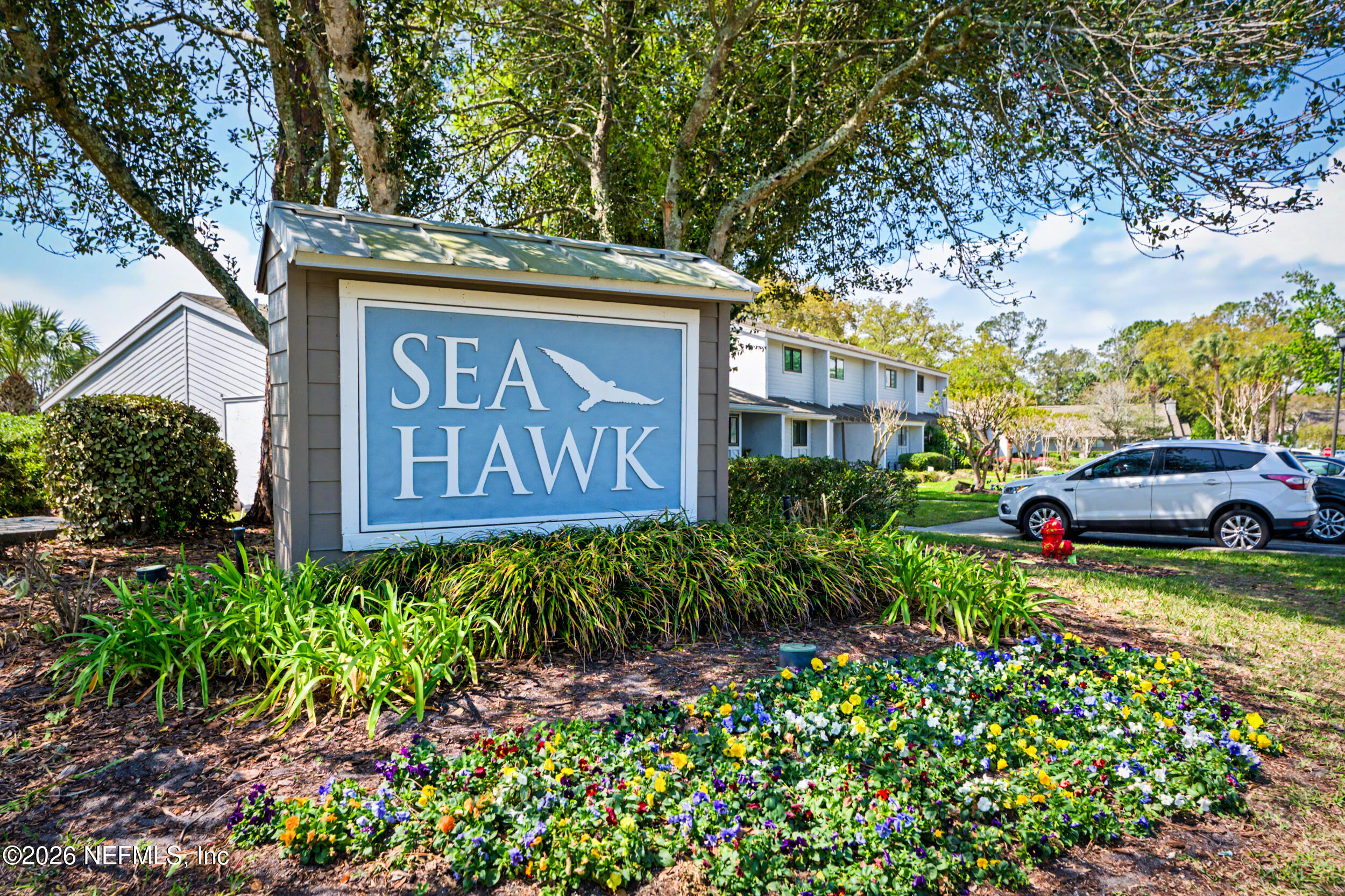 2811 Sea Hawk Drive Ponte Vedra Beach, FL 32082 - Photo 19 of 24 a view of a sign board with a yard