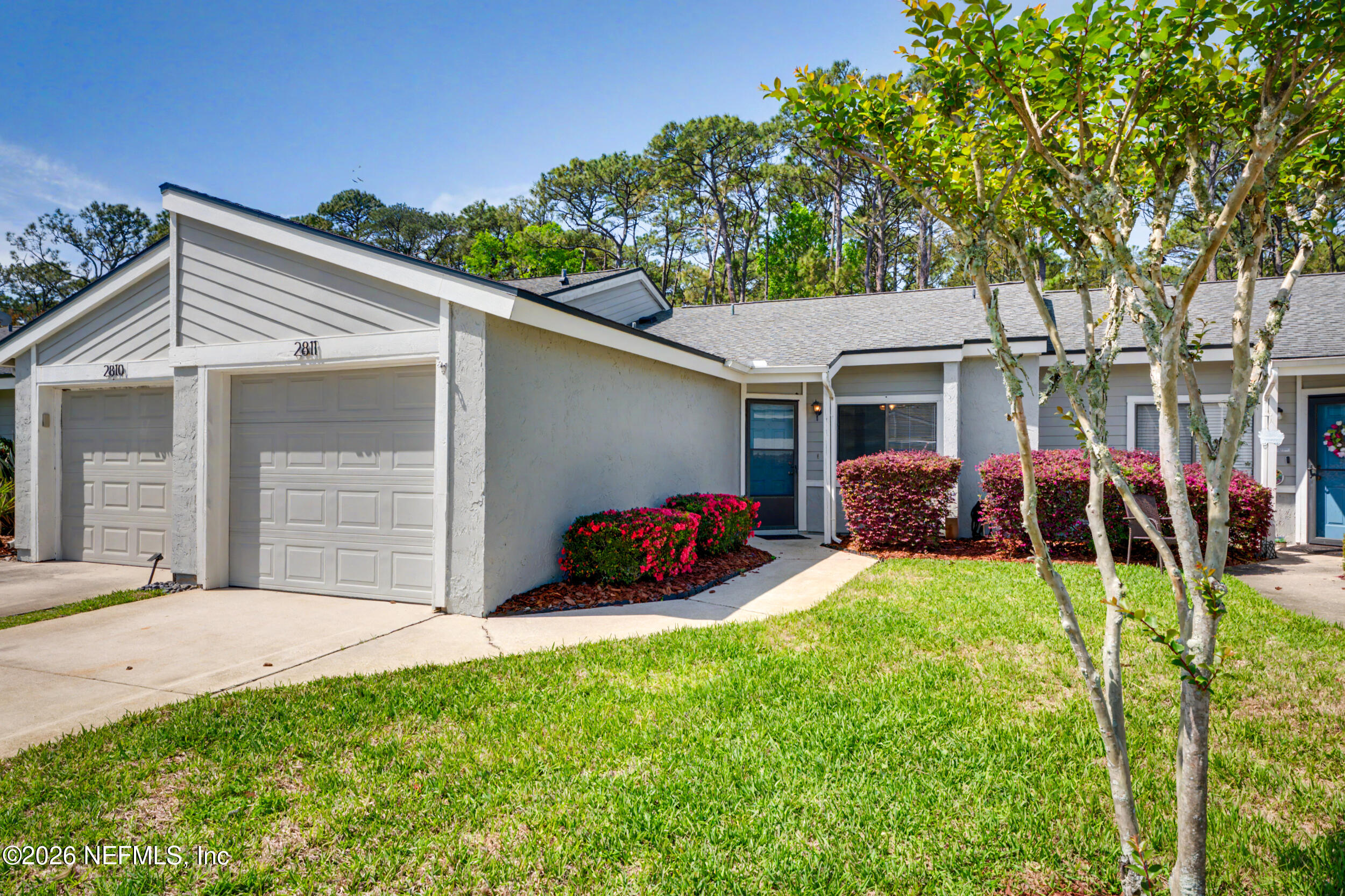2811 Sea Hawk Drive Ponte Vedra Beach, FL 32082 - Photo 2 of 24 a view of a house with a yard